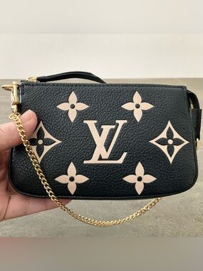 Louis Vuitton Pochette Empriente Leather Bicolor Mini Accessories Pouch
